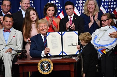 Navy veteran Matt (on the far left) with President Trump